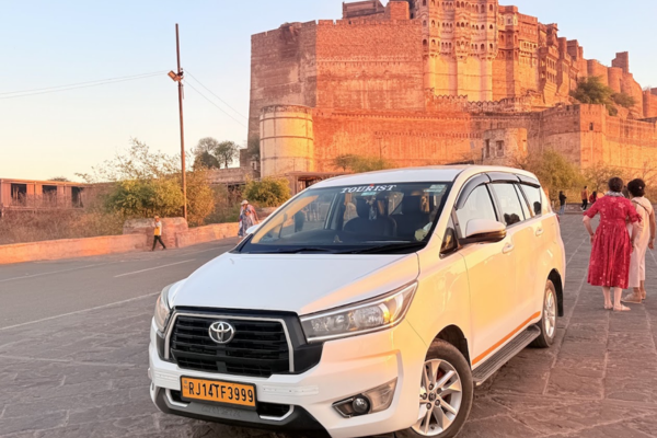 Mehrangarh Fort Jodhpur with white Innova Crysta